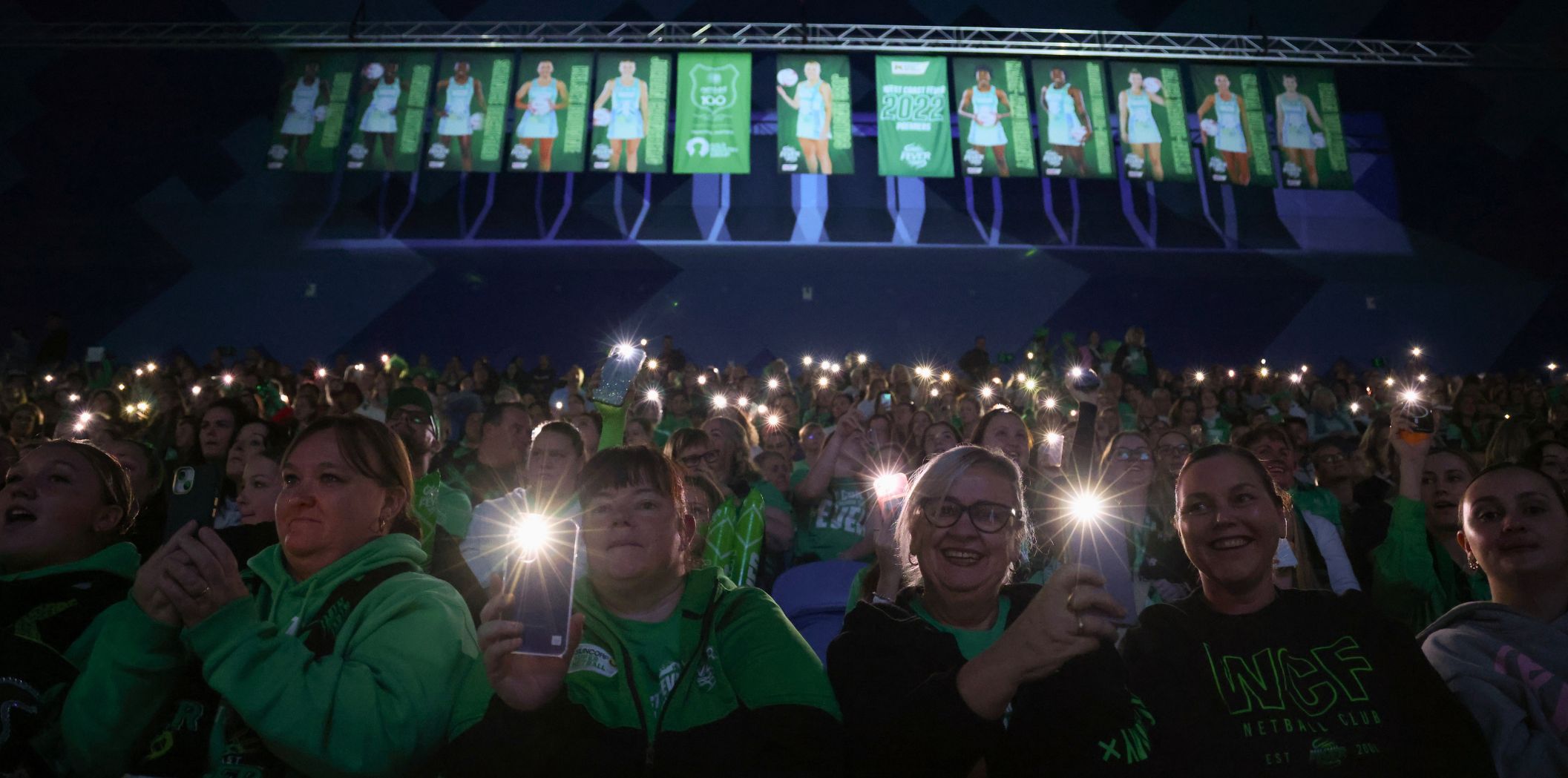 Fever fans illuminate a dark RAC Arena