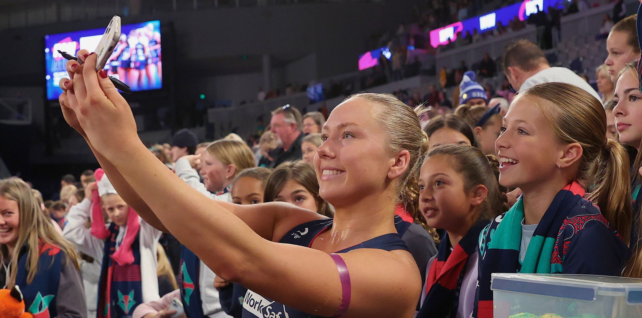 Hannah Mundy takes a selfie with Vixens' fans