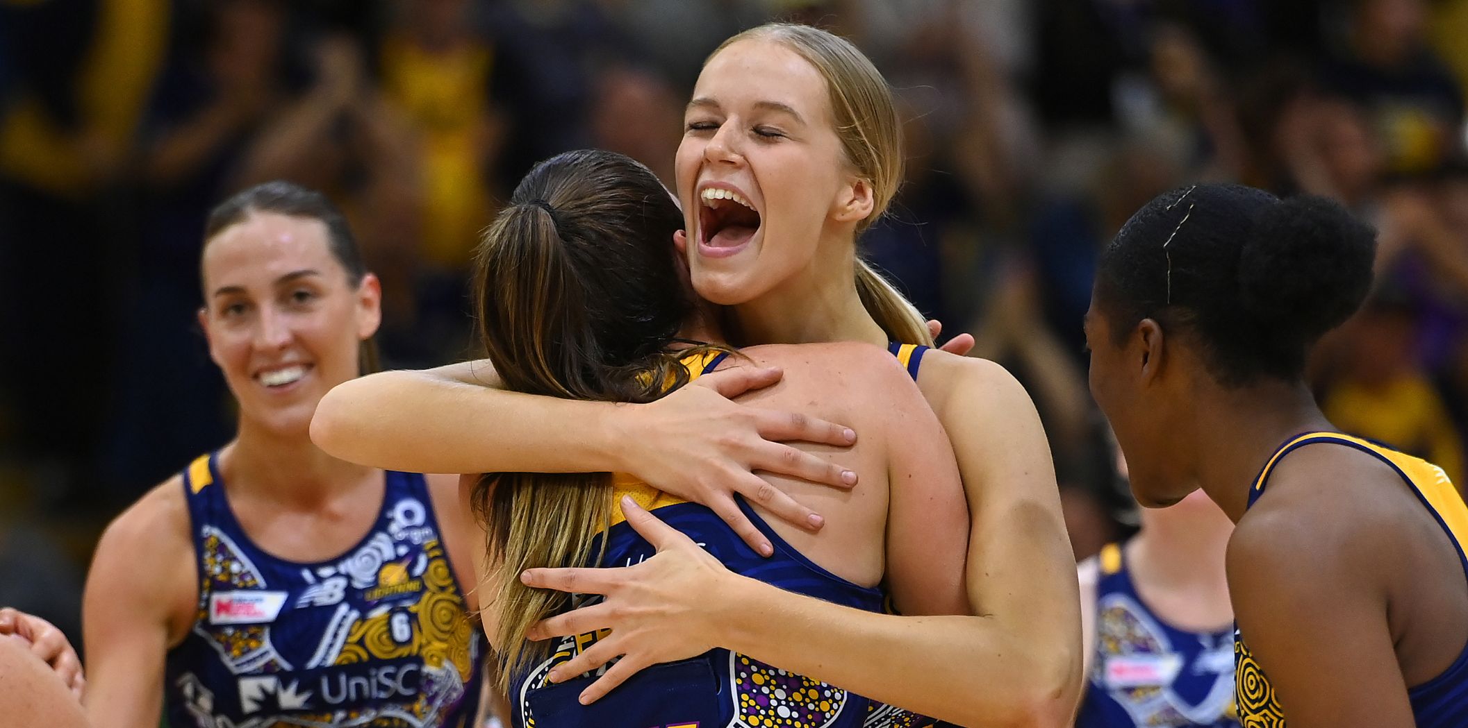 Charlie Bell hugs her SCL teammate