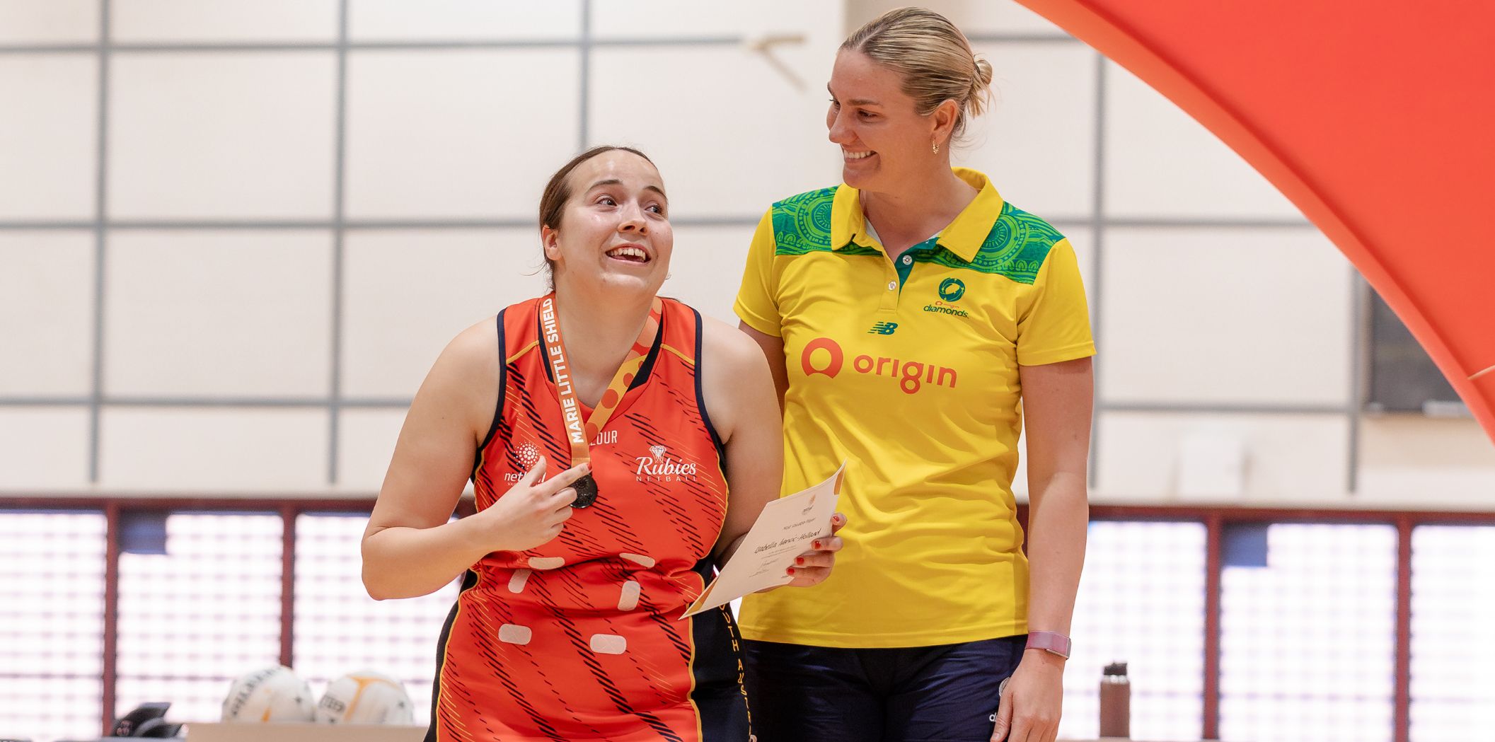 Courtney Bruce presents the player of the tournament.