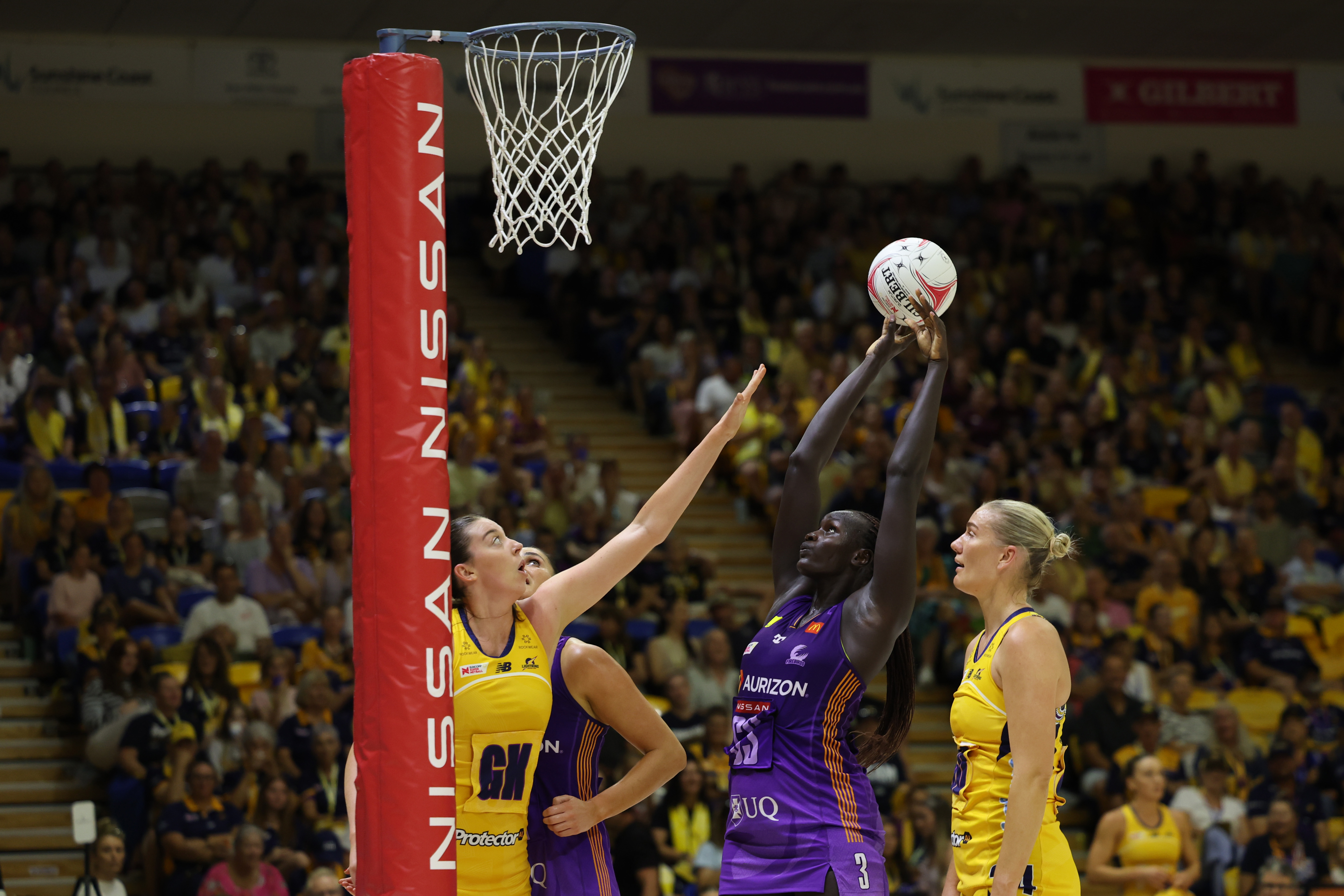 Mary Cholhok shooting at goal during  attacking play.